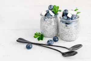 Chia pudding with blueberries and coconut flakes.