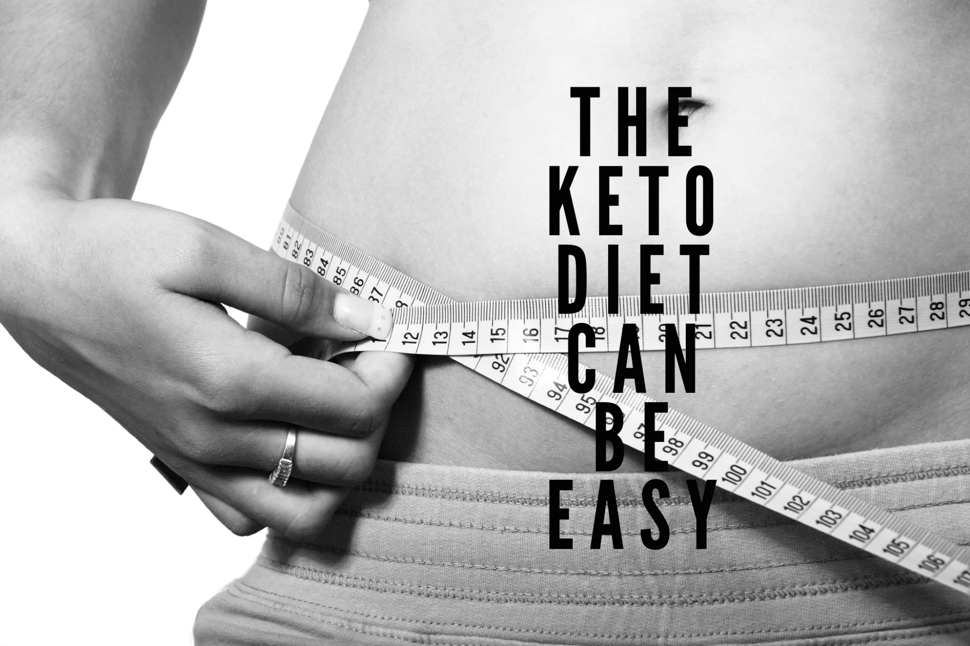 Person measuring waist with text on keto diet.