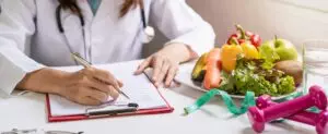 Nutritionist planning healthy diet with fresh food.