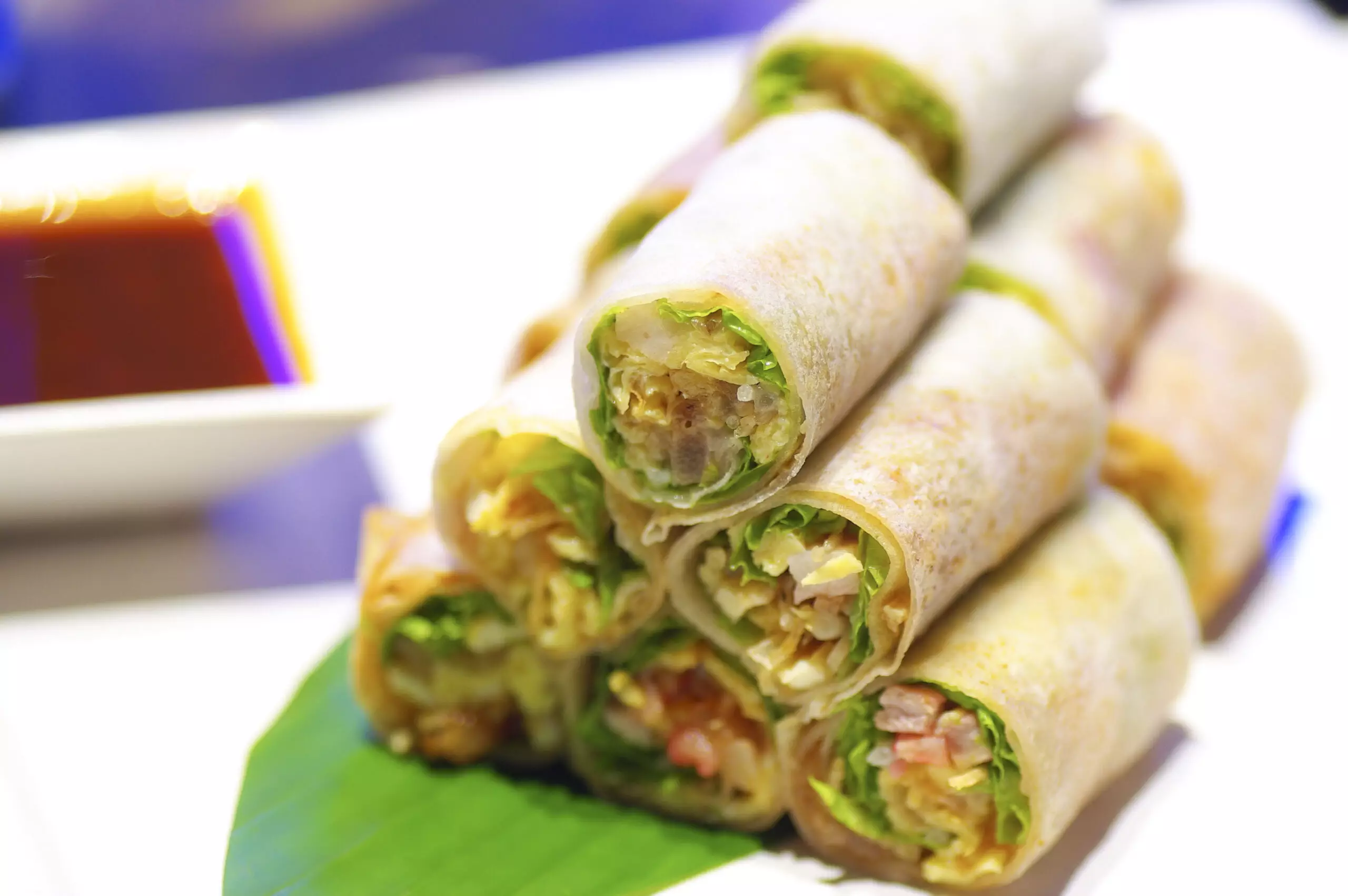 Fresh spring rolls with dipping sauce.